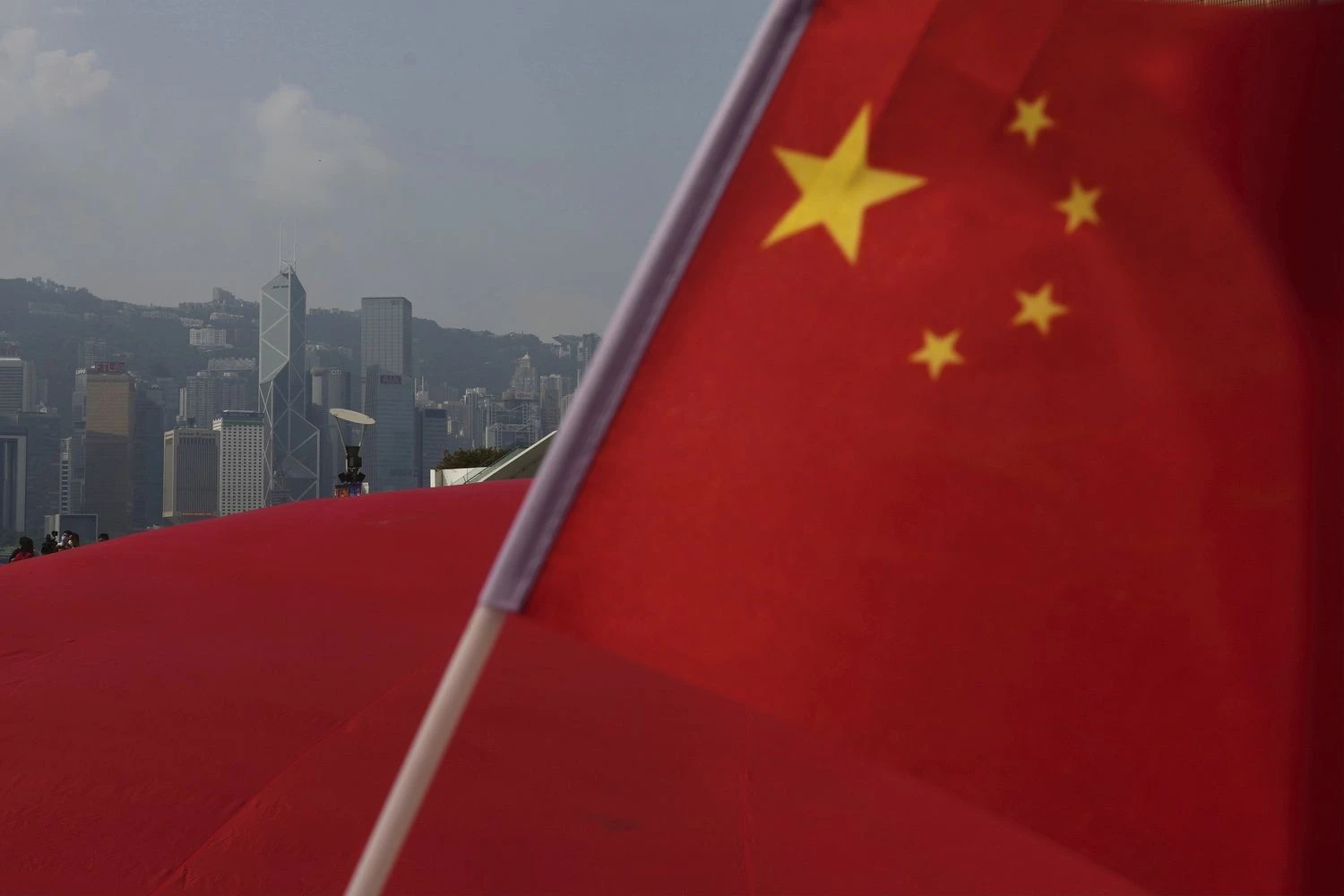 Kinijos vėliava. Vincento Yu (AP/„Scanpix“) nuotr.
