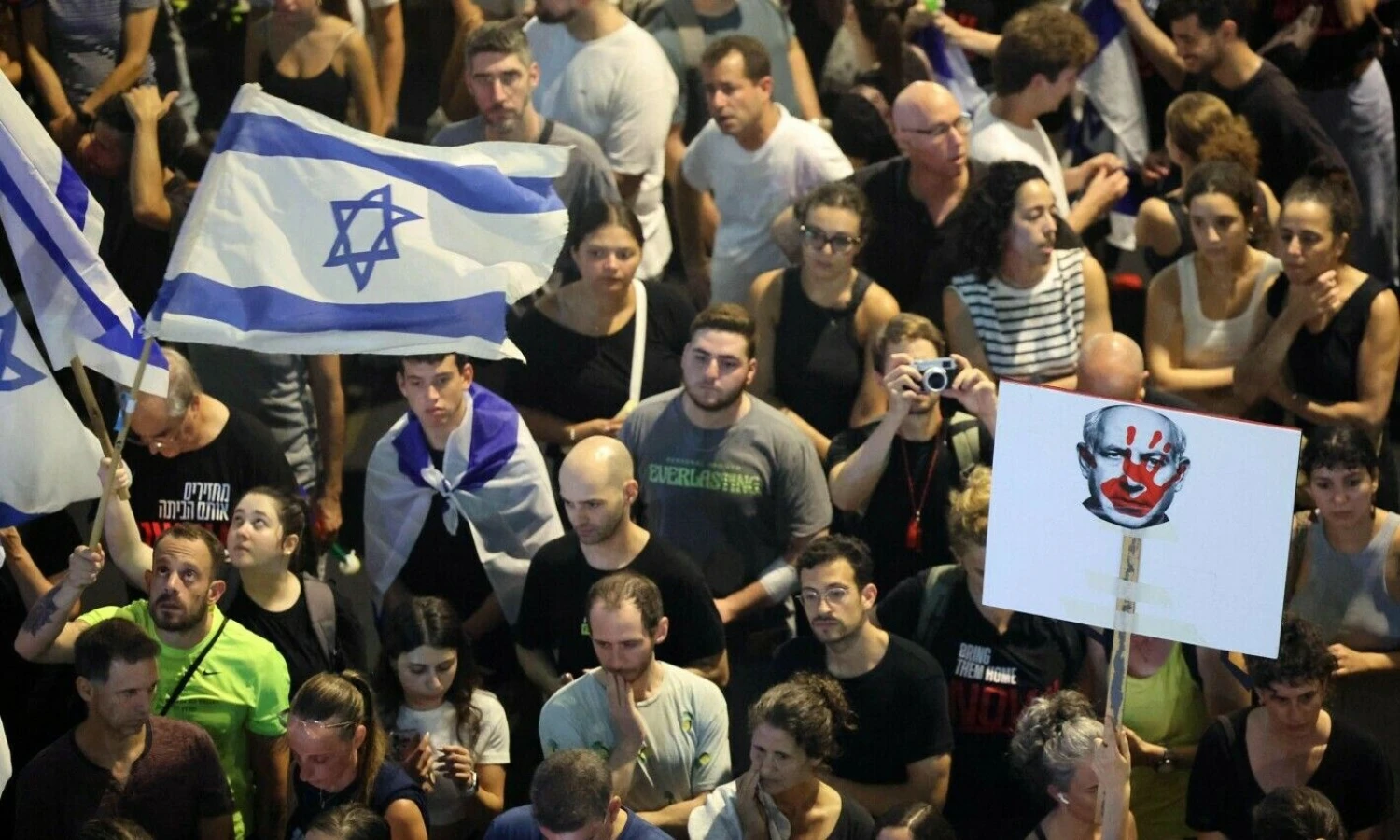 Izraelio gyventojų demonstracija rugsėjo 1 d. Jacko Guezo (AFP / „Scanpix“) nuotr.