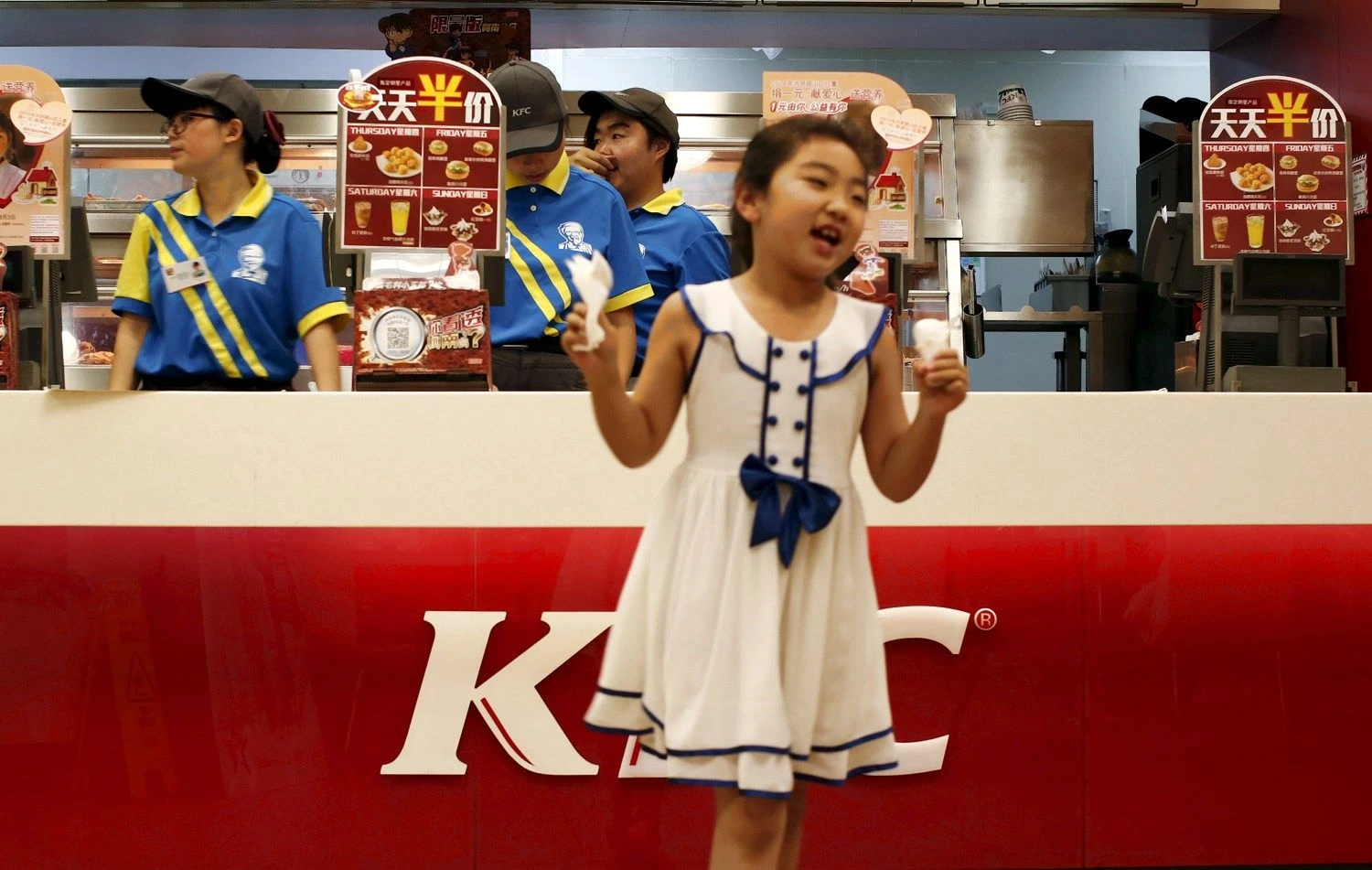 KFC – populiariausias tarptautinis prekės ženklas Kinijoje.  Kim Kyung-Hoon („Reuters“ / „Scanpix“) nuotr.