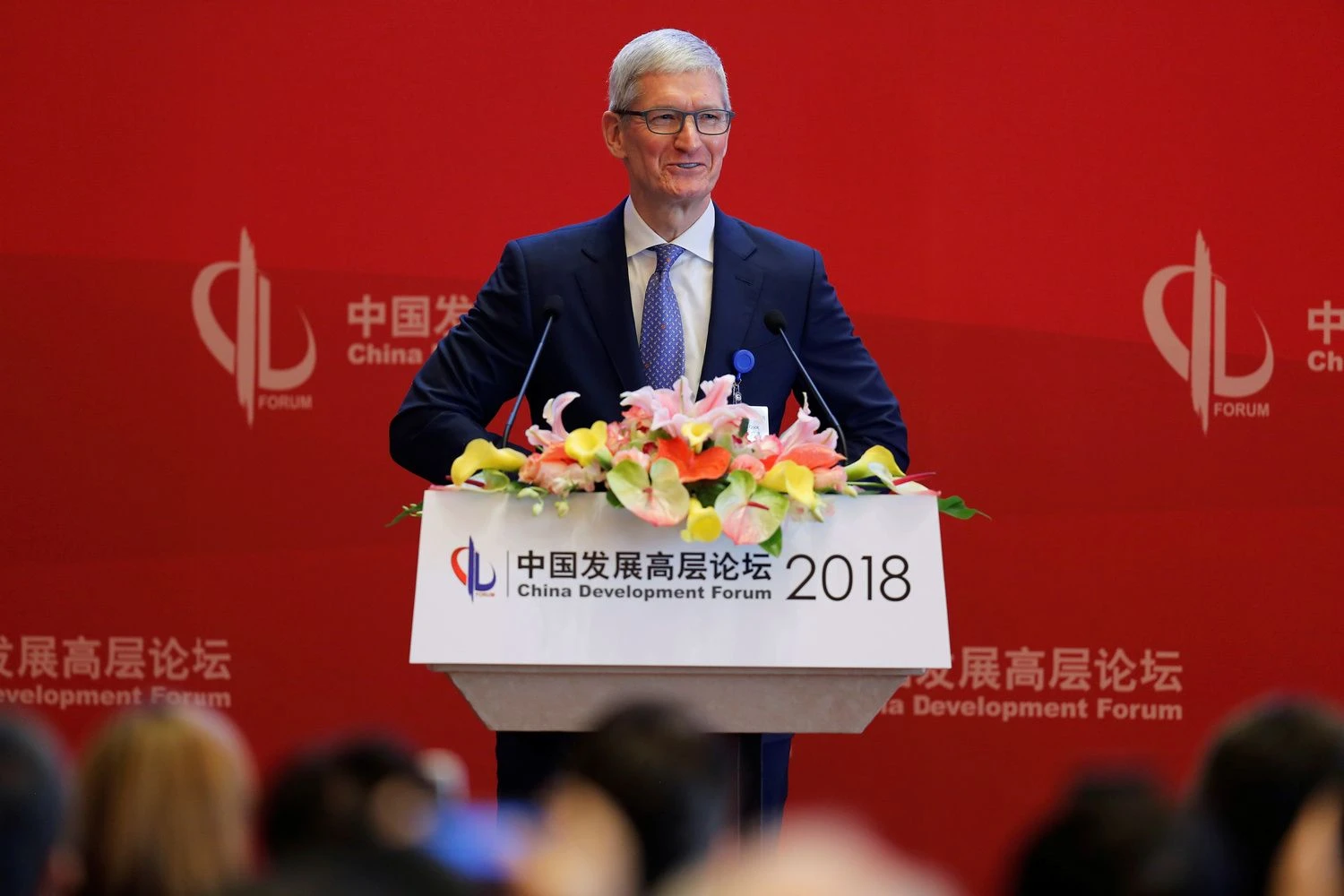 Timas Cookas, "Apple" vadovas šeštadienė Kinijos plėtros forume iš sakyklos ragino nepameisti galvos bręstančiame prekybiniame konflikte. ("Reuters"/"Scanpix") nuotr.