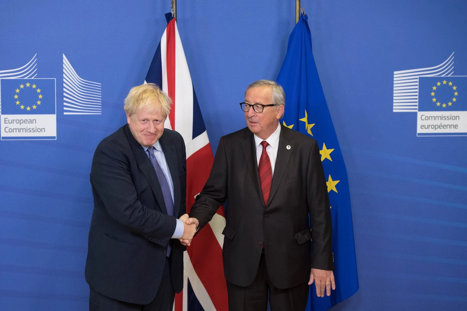 Borisas Johnsonas, JK premjeras, ir Jeanas Claude'as Junckeris, EK pirmininkas. Stefano Rousseau („PA“ / „Scanpix“) nuotr. 