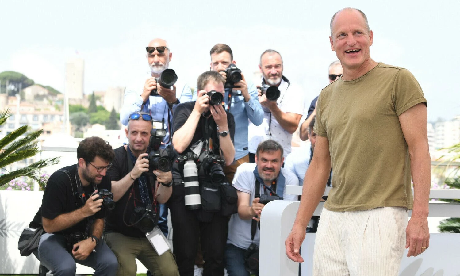 Filmo „Liūdesio trikampis“ (rež. Rubenas Östlundas) aktorius Woody Harrelsonas Kanuose. „Scanpix“ nuotr.