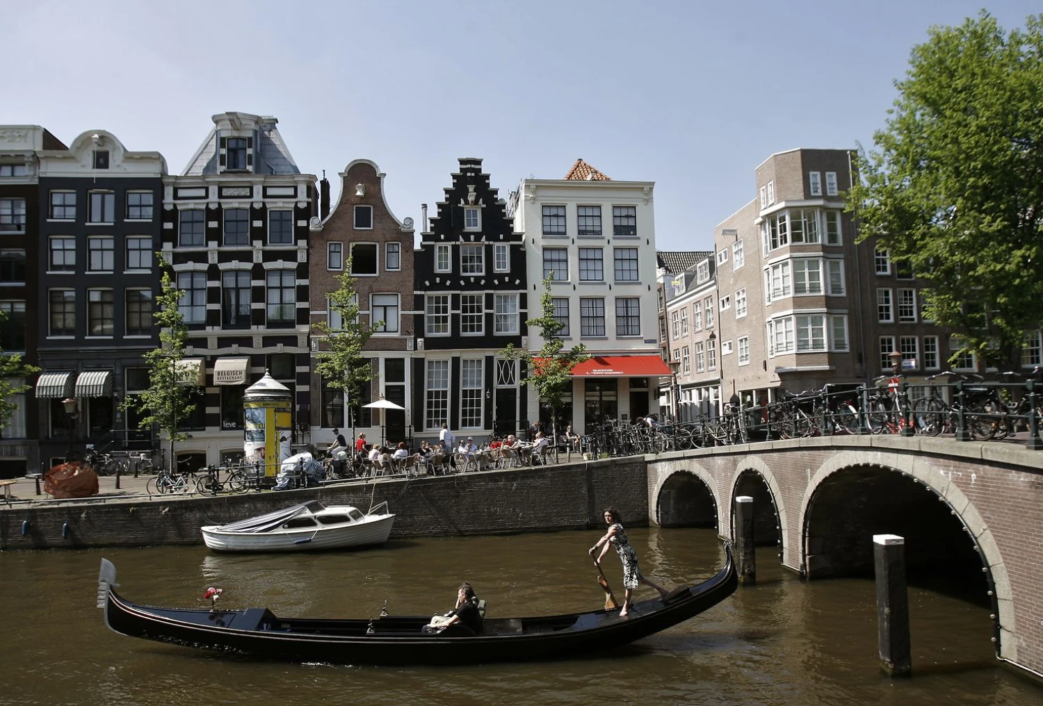 Amsterdamą per metus aplanko apie 20 mln. turistų. Robin van Lonkhuijsen („United Photos“/„Scanpix“) nuotr.  