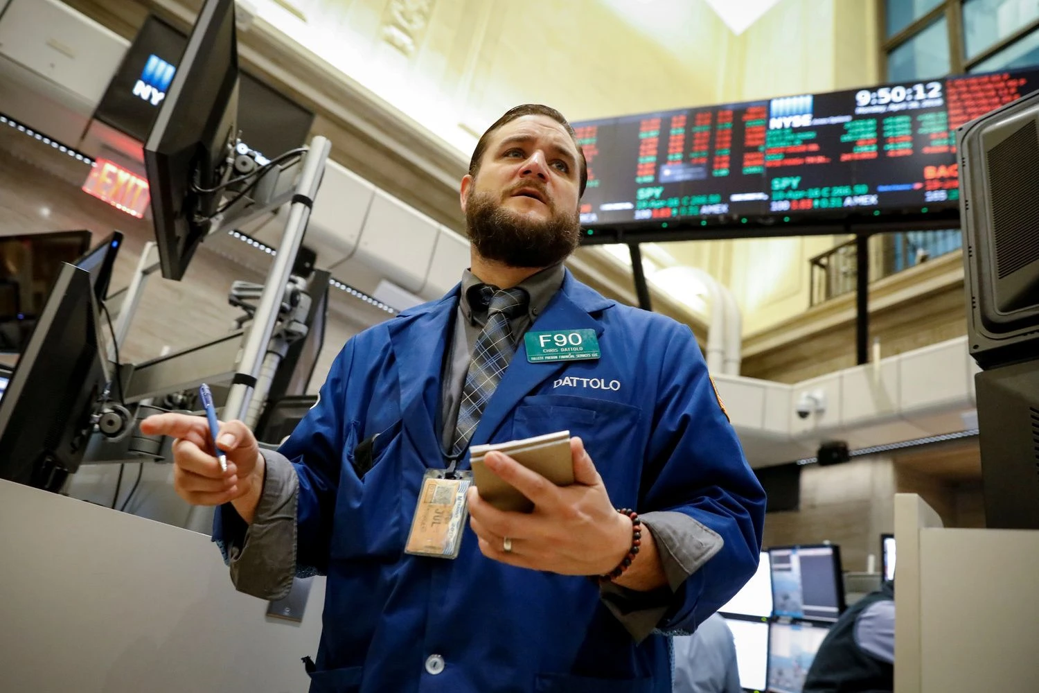 A trader works on the floor of the NYSE American Options market at the New York Stock Exchange, (NYSE) in New York, U.S., April 16, 2018. REUTERS/Brendan McDermid