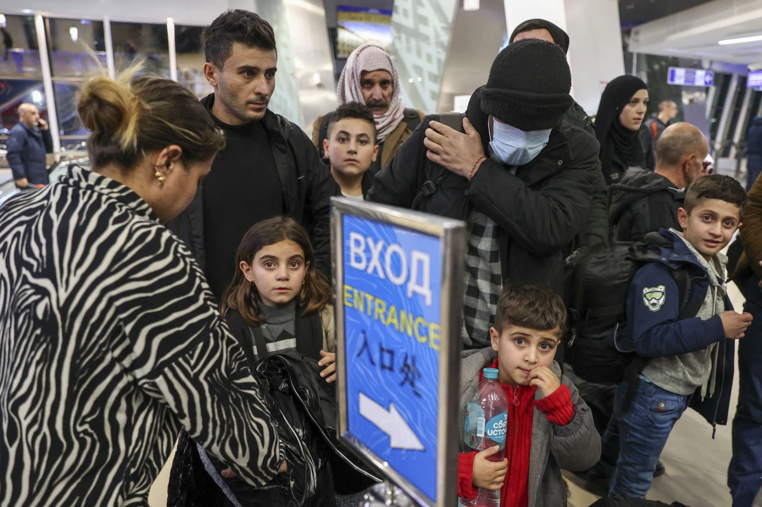 Migrantai lipa į Irako oro linijų skrydį iš Minsko lapkričio pabaigoje. Sergejaus Bobylevo (TASS / „Scanpix“) nuotr.