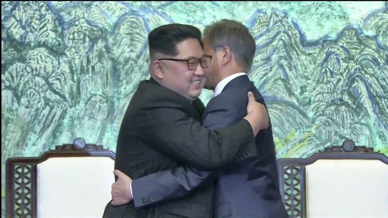 Moonas Jae ir Kim Jong Unas. Reuters / Scanpix nuotr.