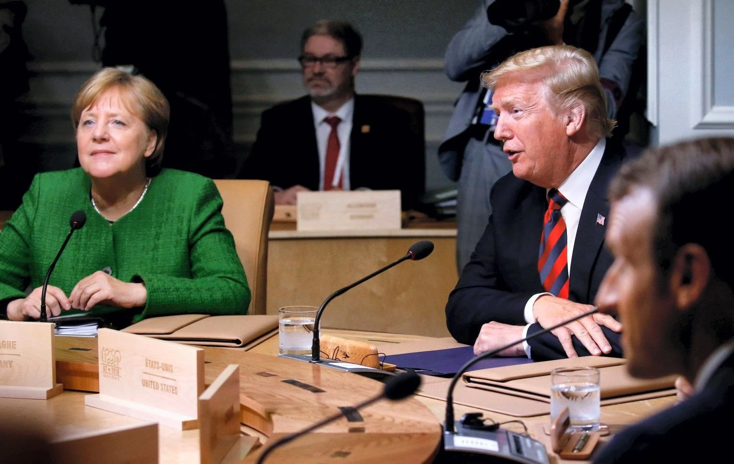 Donaldas Trumas, JAV vadovas, ir Angela Merkel, Vokietijos kanclerė, per G7 susitikimą Kanadoje. Leah Millis („Reuters“ / „Scanpix“) nuotr.