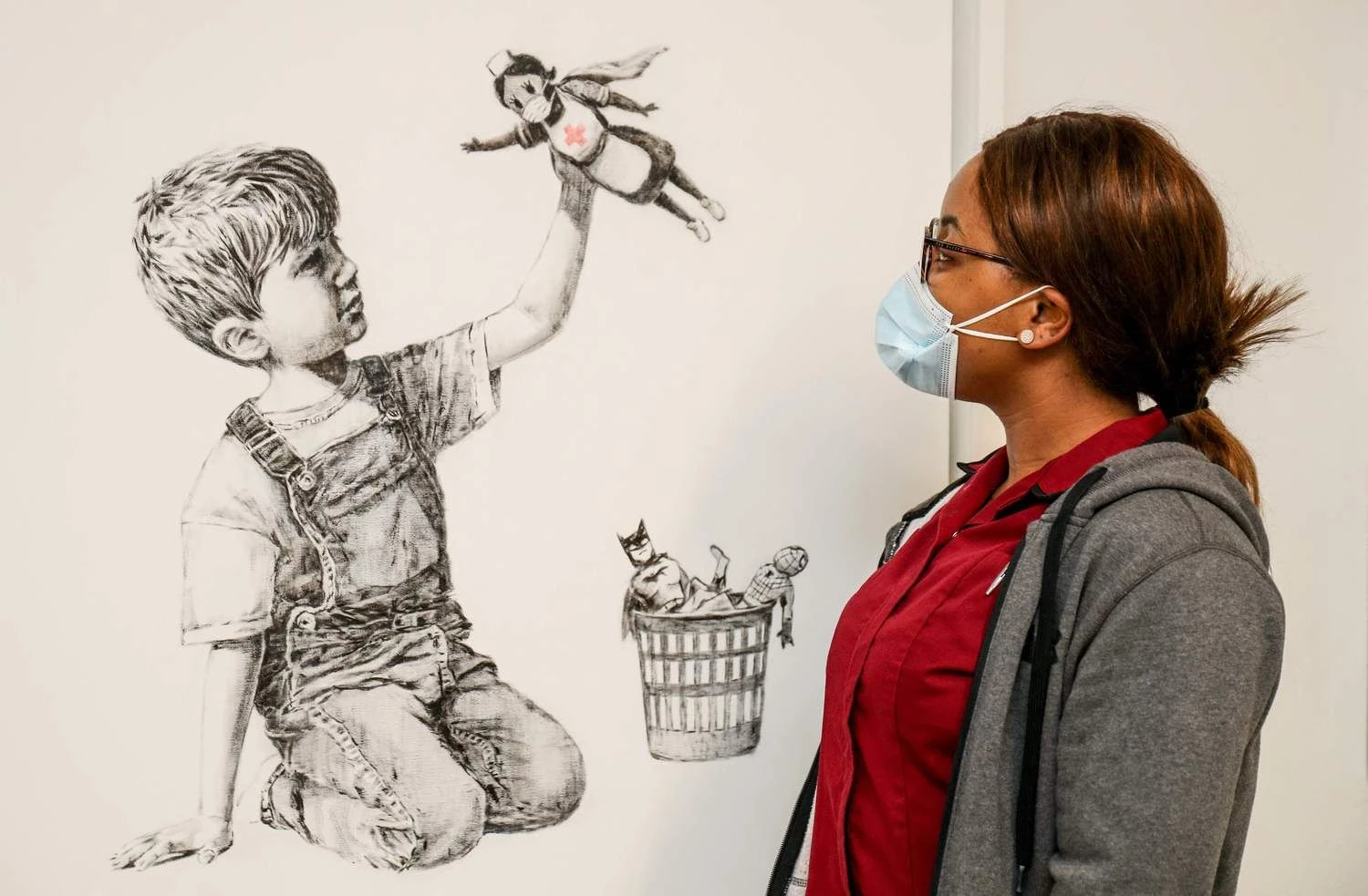 Banksy nupieštas „Game Changer“ kovo 23 d. „Christie's“ aukcione parduotas už rekordinę sumą - 16,75 mln. GBP. Stuarto Martino („AFP / „Scanpix“) nuotr. 