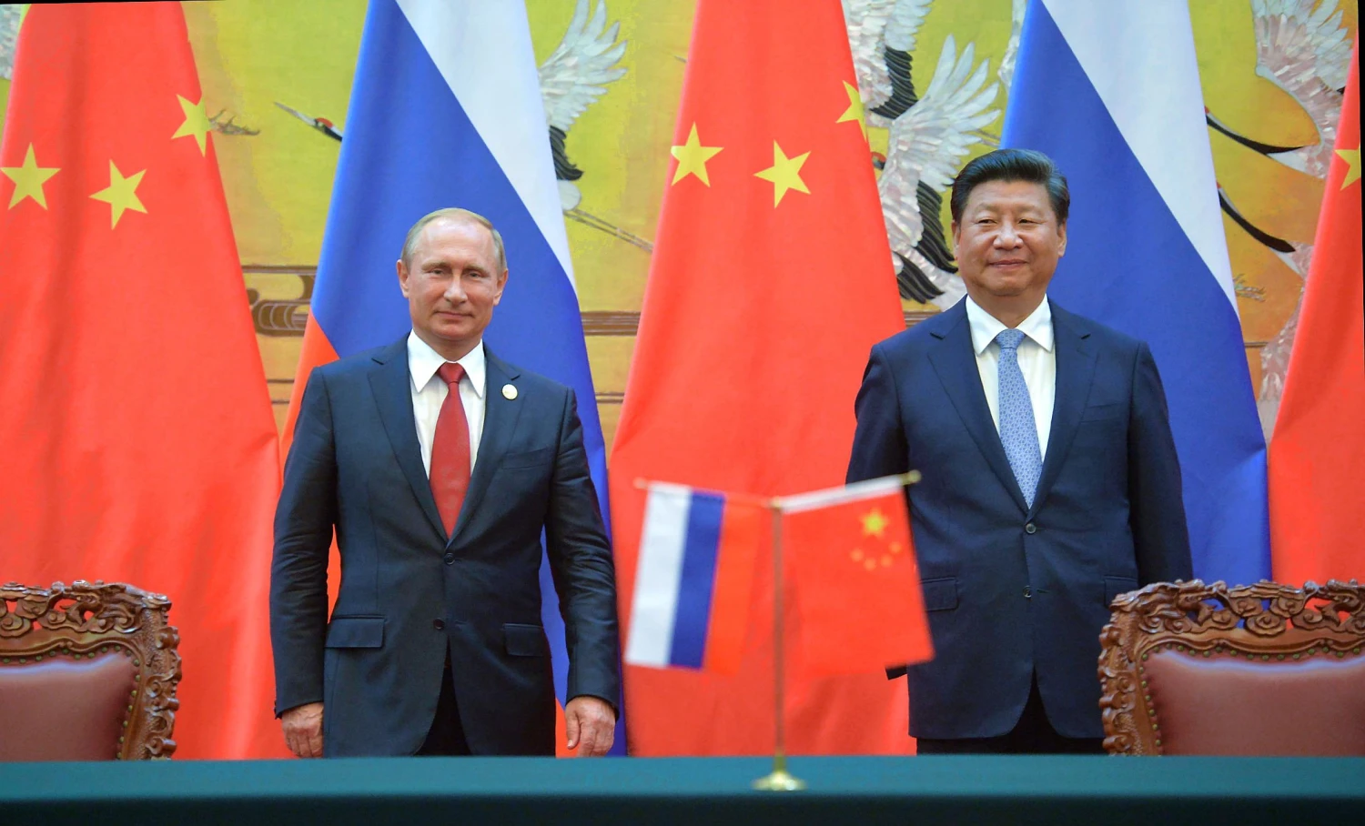 Russian President Vladimir Putin (left) and Chinese President Xi Jinping attend the ceremony of signing documents following Russian-Chinese talks at the Great Hall of the People in Beijing. Alexei Druzhinin/RIA Novosti/Scanpix
