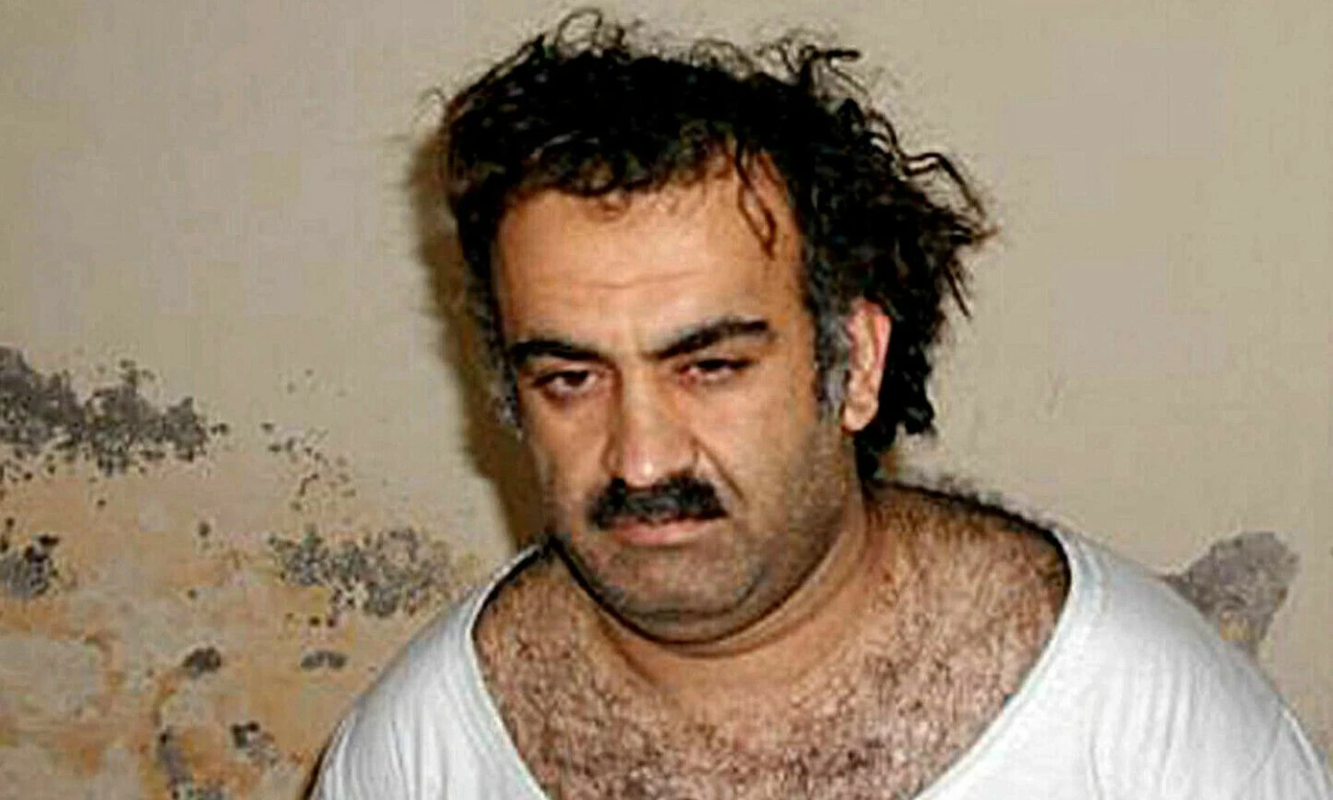 Kh. Sh. Mohammedas – rugsėjo 11–osios atakų sumanytojas netrukus po to, kai buvo sulaikytas. AFP/„Scanpix“ nuotr.