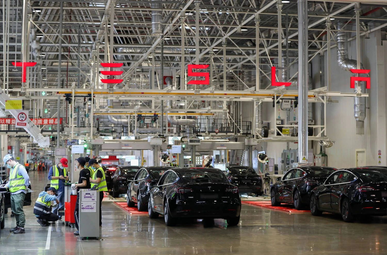 „Tesla“ gamykla Šanchajuje. Ding Ting („Imago“/„Xinhua“/„Scanpix“) nuotr. 