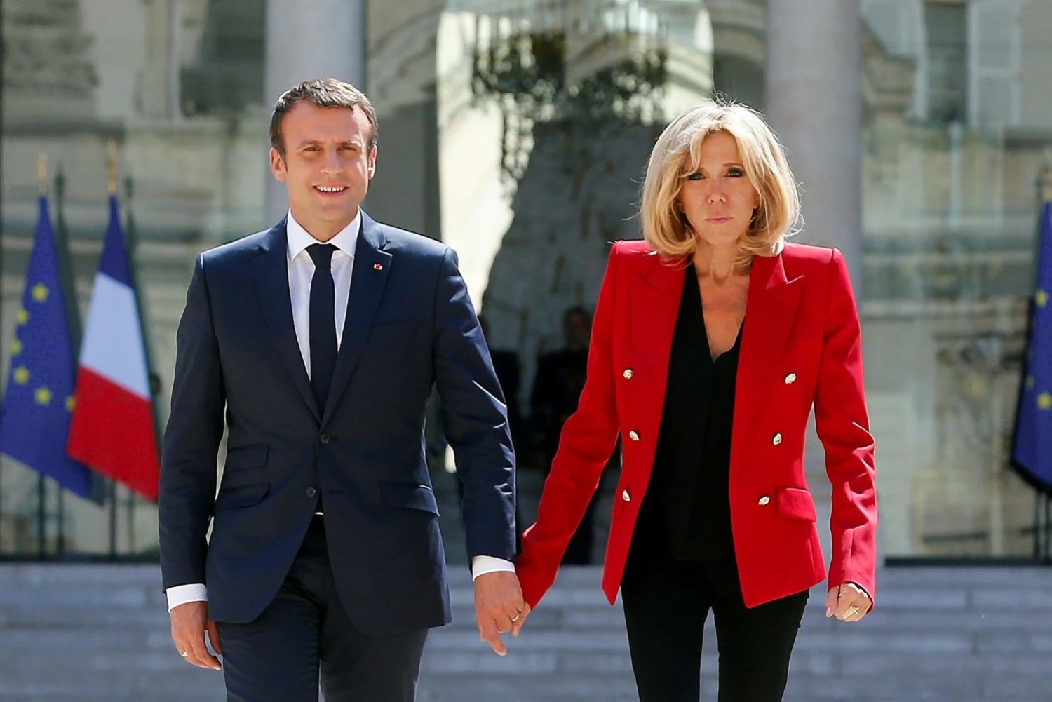 Emmanuelis Macronas, Prancūzijos prezidentas, su žmona Brigitte. Thibault Camus („Reuters“ / „Scanpix“) nuotr. 