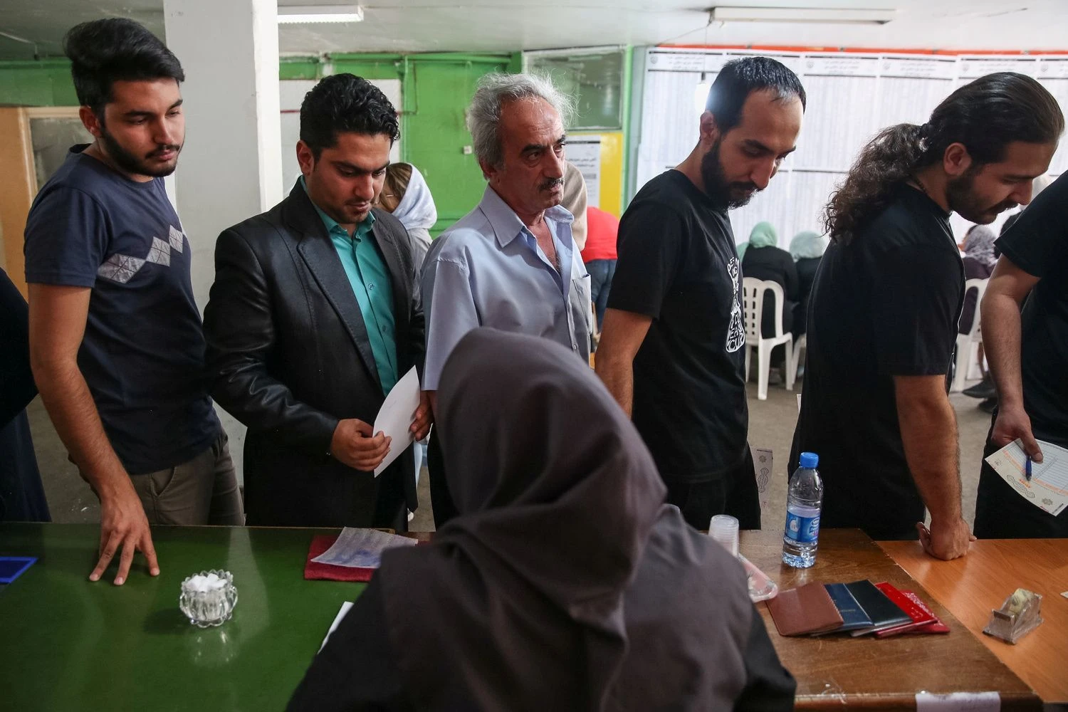 Voters arrive to cast their ballots during the presidential election in a Jewish and Christian district in the centre of Tehran, Iran, May 19, 2017. REUTERS  