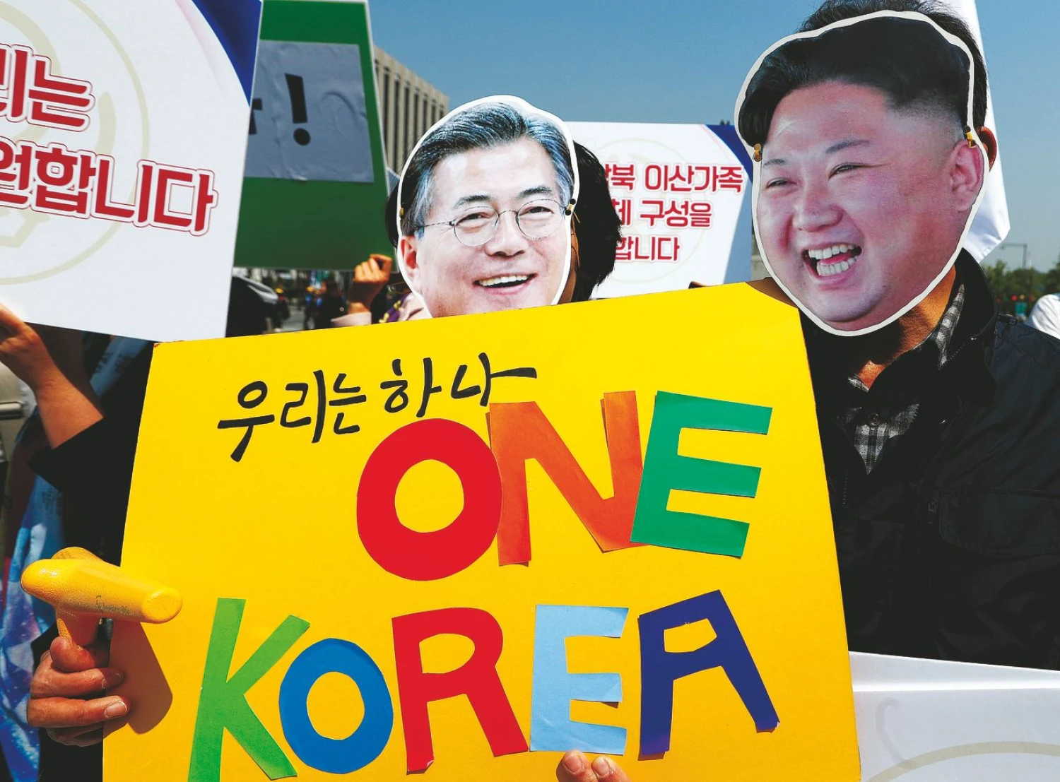 Jaunesnioji Pietų Korėjos karta susivienijimo idėją vertina skeptiškai. Jorge Silvos („Reuters“ / „Scanpix“) nuotr. 