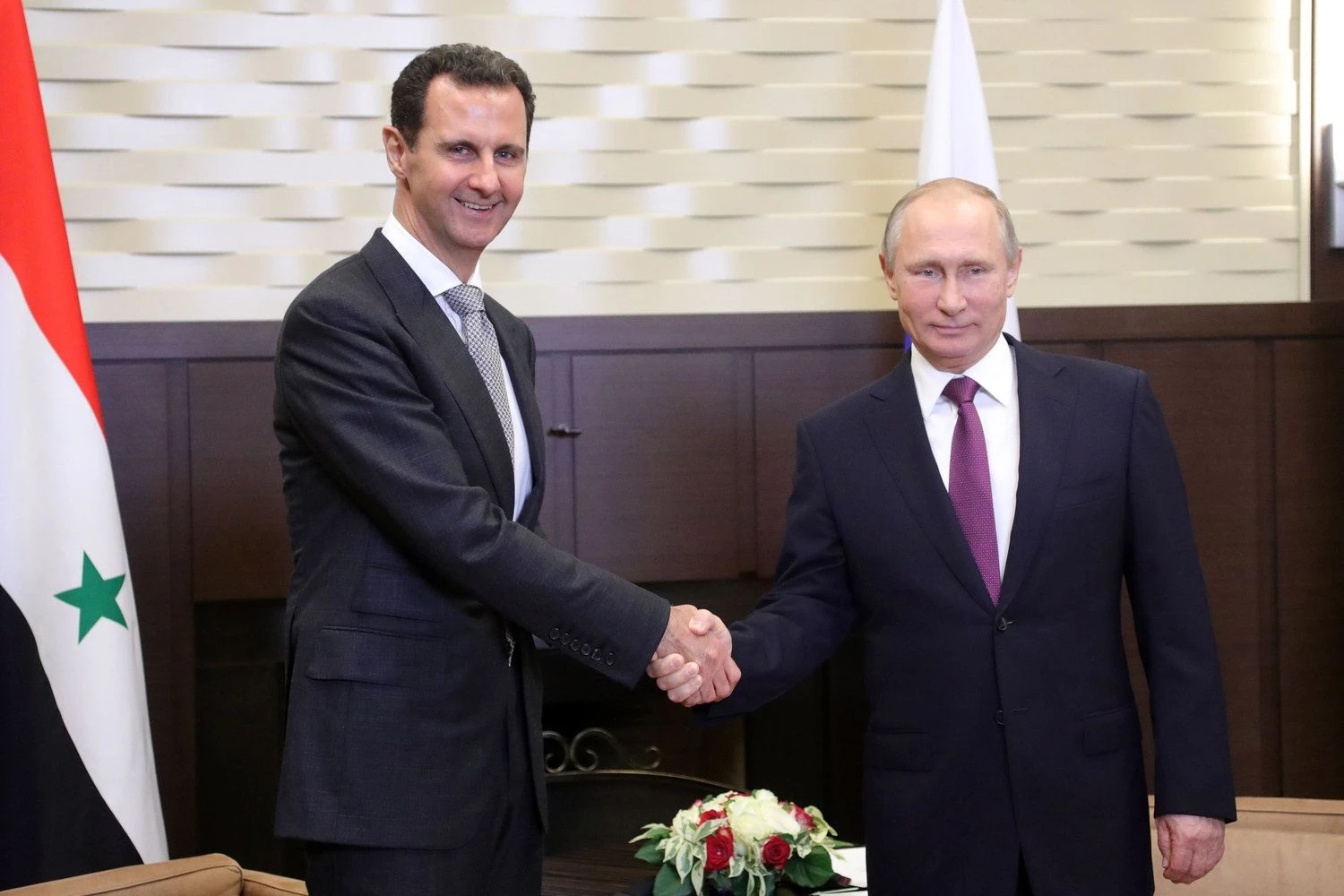 Russian President Vladimir Putin meets with Syrian President Bashar Al-Assad. Michael Klimentyev/Sputnik