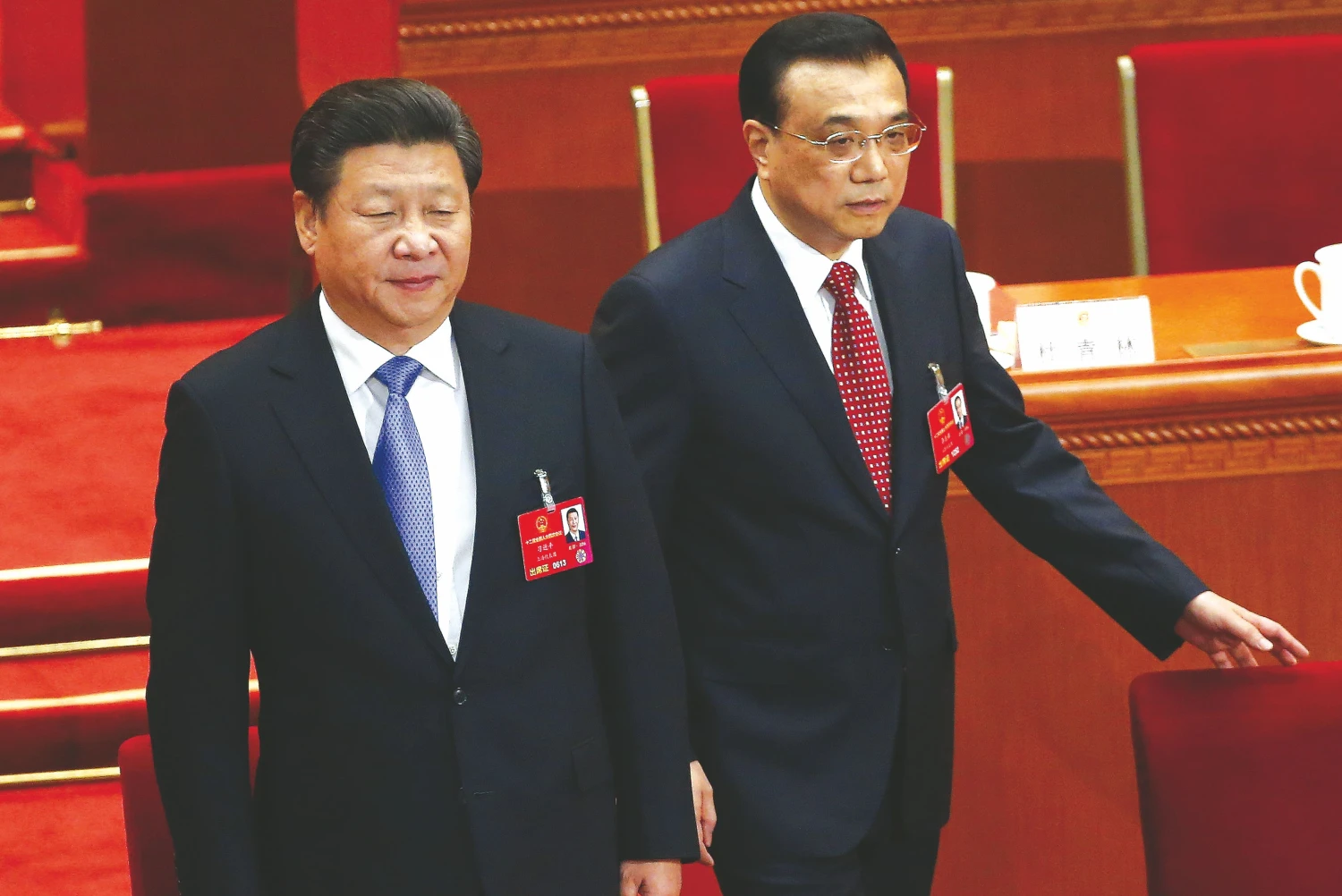 Xi Jinpingo (kairėje), Kinijos prezidento, ir Li Keqiango, šalies premjero, galvos skausmas – kaip reformuojant ūkį išvengti atleidimų bangos. KIM KYUNG-HOONO („Reuters“ / „Scanpix“) nuotr.