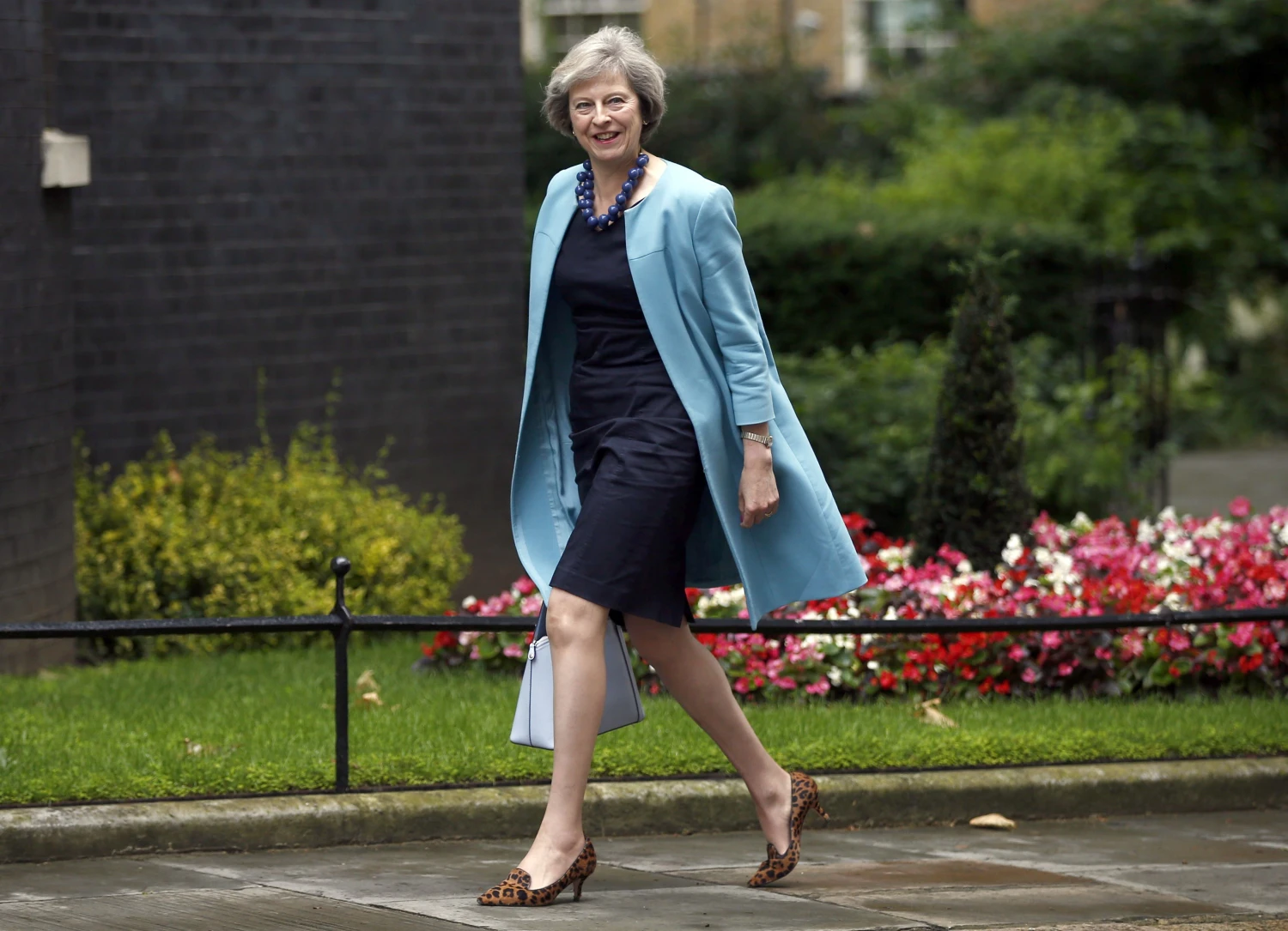  Theresa May, JK vidaus reikalų sekretorė, sutinka su tvirtinančiaisiais, kad, siekiant išvengti ilgalaikių neigiamų pasekmių britų ekonomikai, reikėtų neskubėti su „Brexit“ procesu.
Peterio Nichollso („Reuters“) nuotr. 