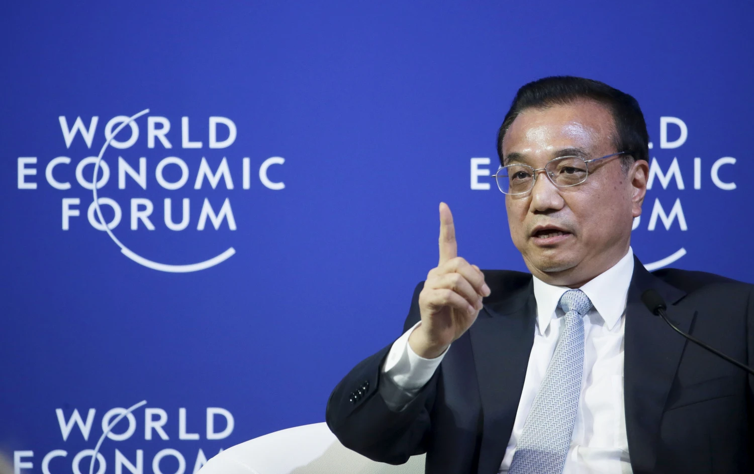 China's Premier Li Keqiang answers a question during a meeting with executives from foreign companies at the World Economic Forum (WEF) in China's port city Dalian September 9, 2015. Li said on Wednesday that the recent adjustment in the yuan was "very small" and that there is no basis for continued devaluation in the currency. REUTERS/Jason Lee