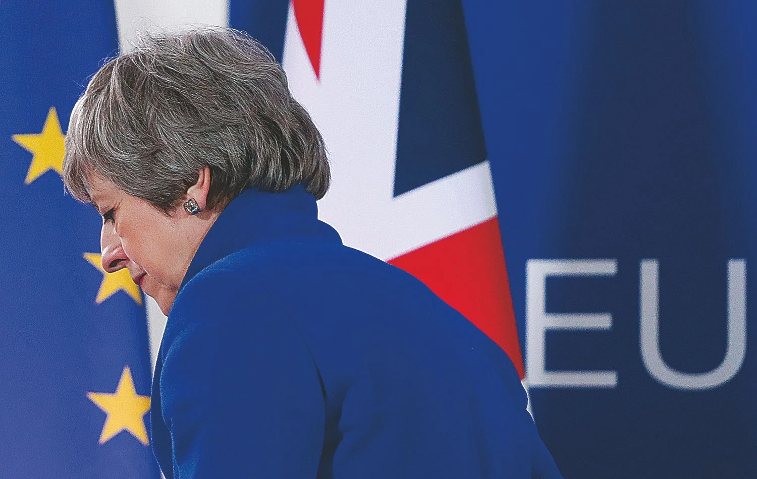 JK premjerė yra pasižadėjusi pasitraukti iš posto, kai tik „Brexit“ susitarimas bus ratifikuotas ir kad naujasis premjeras turėtų galimybę vesti „Brexit“ derybas į antrą derybų stadiją – dėl ateities santykių tarp ES ir JK. SUSANOS VEROS („Reuters“ / „Scanpix“) nuotr.  