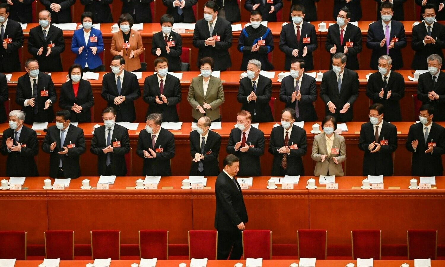 Kinijos parlamento posėdis. Grego Bakerio (AFP / „Scanpix“) nuotr.