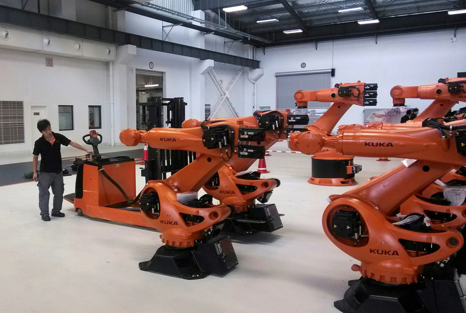 Kai kinai iš vokiečių nupirko robotų gamintoją „Kuka“, Berlynas sunerimo, kad vokiškos technologijos gali išplaukti Pekino kryptimi. Pete Sweeney („Reuters“ / „Scanpix“) nuotr.

