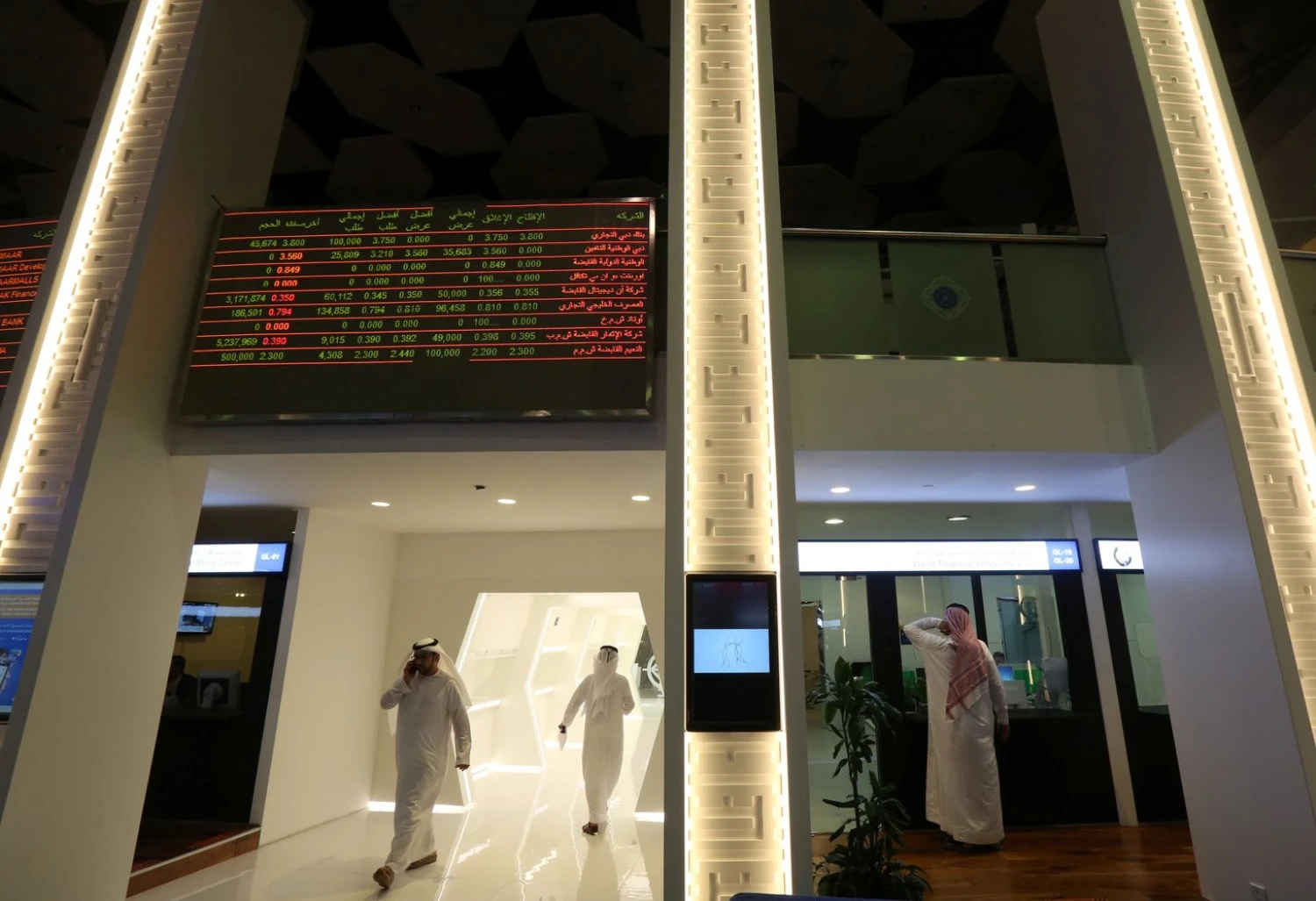 Investors are seen at the Dubai International Financial Market, in Dubai, UAE  April,16, 2018. REUTERS/Satish Kumar