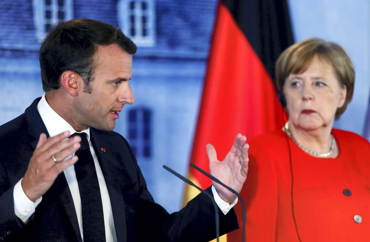 Vokietijos ir Prancūzijos lyderiai Angela Merkel ir Emmanuelis Macronas. Hannibalo Hanschkės („Reuters“ / „Scanpix“) nuotr.