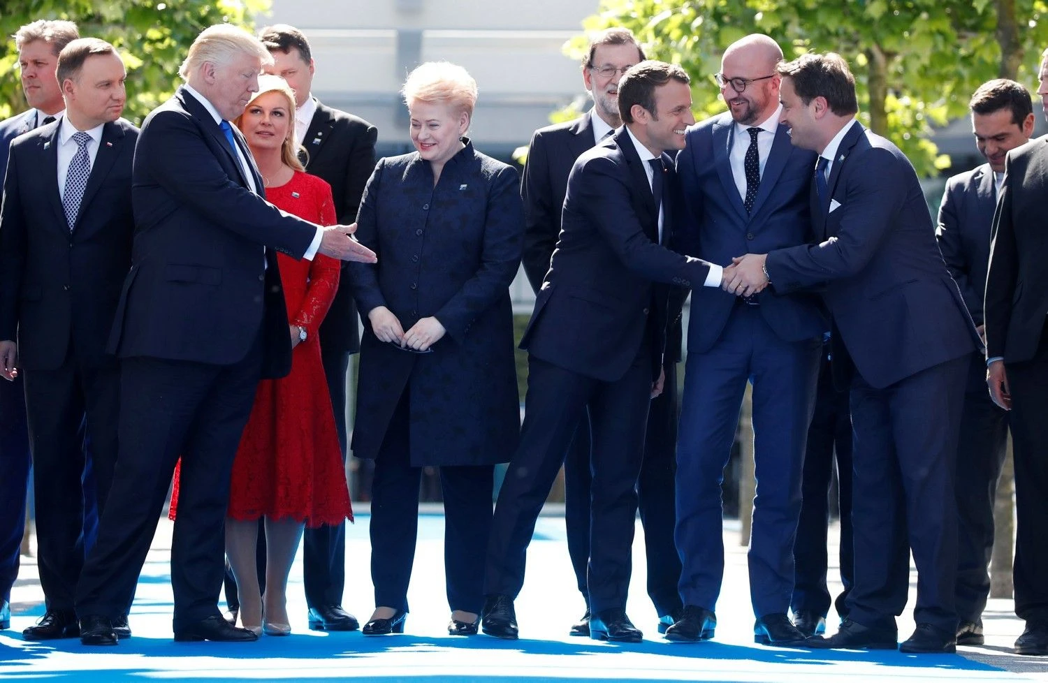 Dalia Grybauskaitė, Lietuvos prezidentė, ir Donaldas Trumpas, JAV vadovas, NATO viršūnių susitikime. Christiano Hartmanno (Reuters / Scanpix) nuotr.
