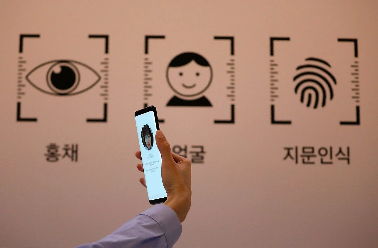 Kim Hong-Ji („Scanpix“/„Reuters“) muotr.