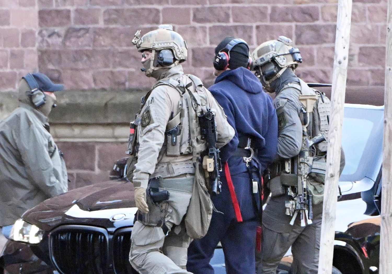 Vokietijos pareigūnai sulaikę S. Kuzniecovą. (DPA / „Scanpix“) nuotr.