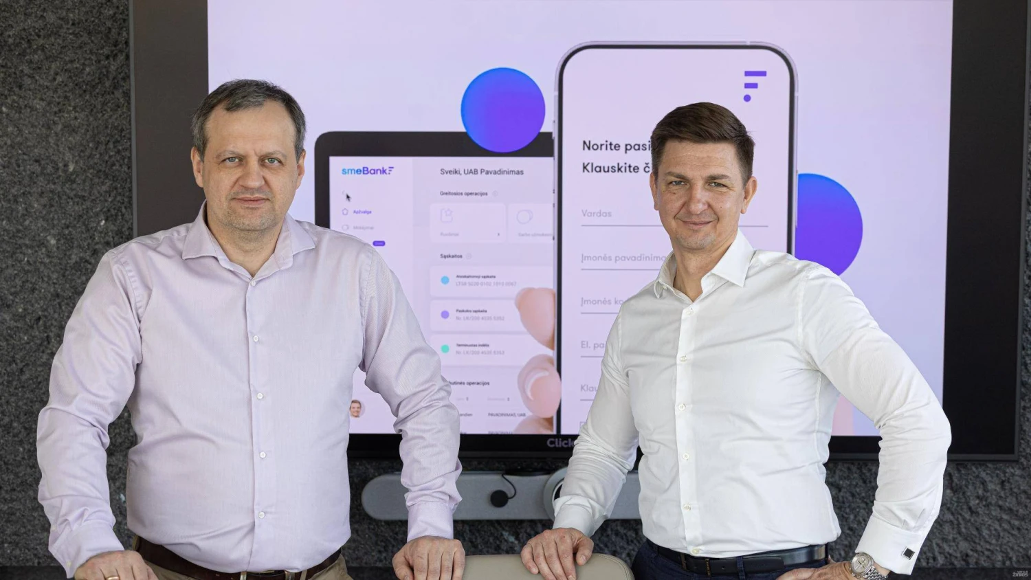 Raimondas Berniūnas (kairėje) ir Vaidotas Cucėnas, „SME Bank“ valdybos nariai. Vladimiro Ivanovo (VŽ) nuotr.