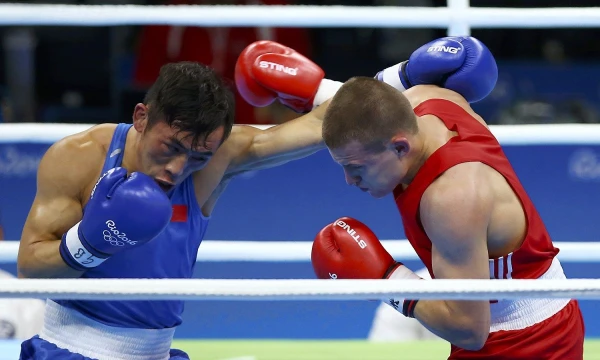 Eimanto Stanioni (Lietuva) ir Liu Wei (Kinija) of China (PRC) kova. „Reuters“ / „Scanpix“ nuotr.