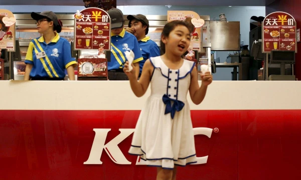 KFC – populiariausias tarptautinis prekės ženklas Kinijoje.  Kim Kyung-Hoon („Reuters“ / „Scanpix“) nuotr.