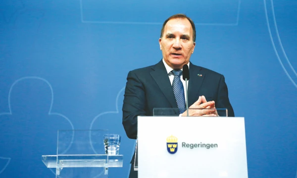 Stefanui Lofvenui, Švedijos premjerui, džiaugsmą dėl ūkio rodiklių kartina gyventojų nerimas dėl pabėgėlių krizės. Christine Olsson („REUTERS“ / „SCANPIX“) nuotr.