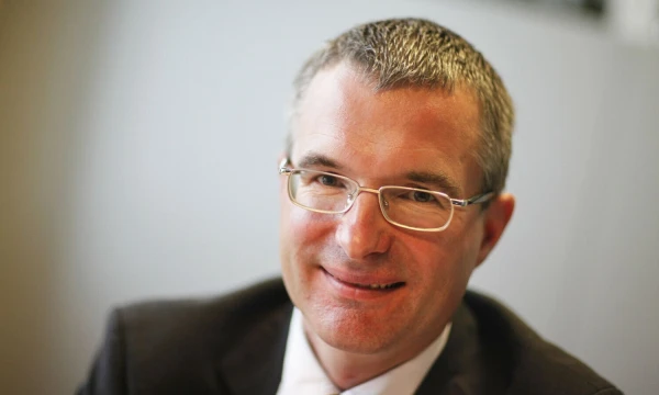 Dietmaras Hornungas, Kredito reitingų agentūros „Moody`s Investors Service“ vadovas. Johannes Eisele („Reuters“/„Scanpix“) nuotr.