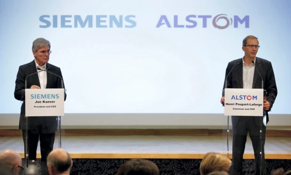 „Alstom“ ir „Siemens“ geležinkelio verslų susijungimas, tikimasi, sukurs vadinamąjį Europos čempioną, galintį konkuruoti su Kinija. stephane’O mahe („Reuters“ / „Scanpix“) nuotr.