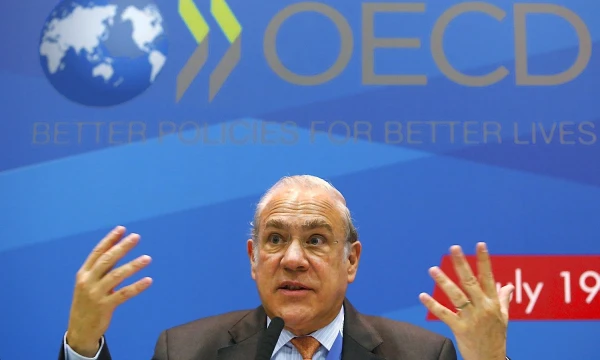 Ekonominio bendradarbiavimo ir plėtros organizacijos generalinis sekretorius Angelas Gurria gali jau šiemet vasarą pasveikinti naują bendrijos narę - Lietuvą. Grigory Dukor ("Reuters") nuotr.