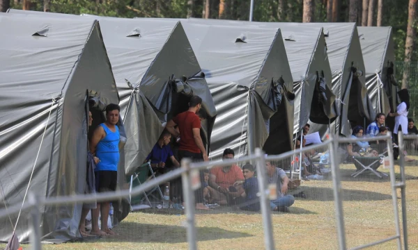 Migrantai Kapčiamiestyje. Petro Malūko/AFP/„Scanpix“ nuotr.