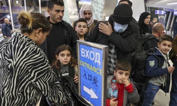 Migrantai lipa į Irako oro linijų skrydį iš Minsko lapkričio pabaigoje. Sergejaus Bobylevo (TASS / „Scanpix“) nuotr.