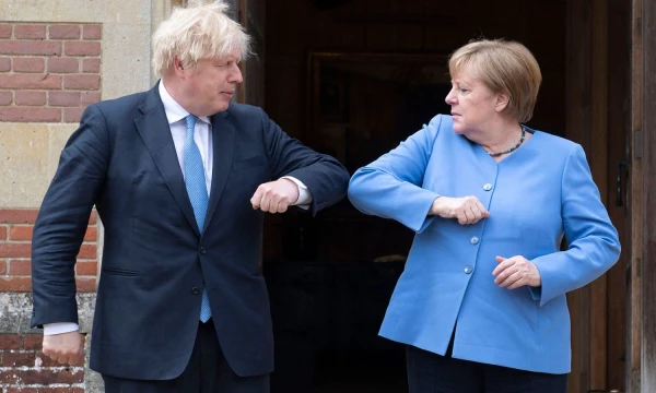 Borisas Johnsonas, Jungtinės Karalystės premjeras ir Angela Merkel, Vokietijos kanclerė. David Rose („AFP“ / „Scanpix“) nuotr. 