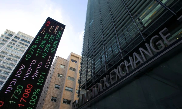 FILE PHOTO: An electronic board displaying market data is seen at the entrance of the Tel Aviv Stock Exchange, in Tel Aviv, Israel January 29, 2017. REUTERS/Baz Ratner/File Photo