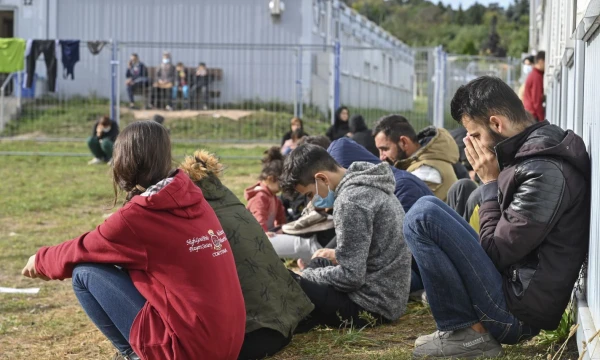 Nelegaliai per Lenkiją į Vokietiją atvykusių migrantų stovykla Eizenhiutenštate, Vokietijos Brandenburgo žemėje. Patrick Pleul (DPA/AP/„Scanpix“) nuotr. 
