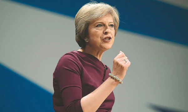 JK premjerė Theresa May: „Po „Brexit“ būsime globali valstybė.“ Toby Melville („Reuters“ / „Scanpix“) nuotr.