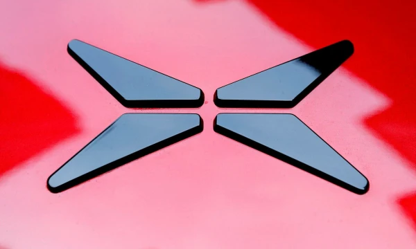 Investuotojų dėmesį patraukė „Xpeng“ ir „Didi“ partnerystė. Mike Segar (Reuters“ / „Scanpix“) nuotr.