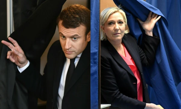 Emmanuelis Macronas, Prancūzijos prezidentas, ir Marine Le Pen, buvusi kraštutinių dešiniųjų partijos „Nacionalinis sambūris“ vadovė. VŽ koliažas.