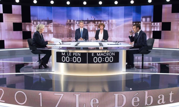 French presidential election candidate for the far-right Front National (FN) party, Marine Le Pen and French presidential election candidate for the En Marche ! movement, Emmanuel Macron pictured during the live brodcast face-to-face televised debate.  SIPA/Scanpix
