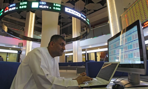 An investor is seen at the Dubai International Financial Market, in Dubai, UAE  April,16, 2018. REUTERS/Satish Kumar