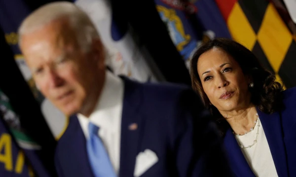 Joe Bidenas ir Kamala Harris. Carloso Barria („Reuters“ / „Scanpix“) nuotr.