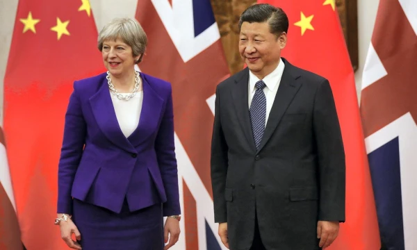 Theresa May, JK premjerė, ir Xi Jinpingas, Kinijos prezidentas. Wu Hongo (Reuters / Scanpix) nuotr.