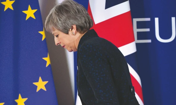 Theresa May, Jungtinės Karalystės premjerė, pristatė savo pasitraukimo planą. Emmanuelio Dunando (AFP / „Scanpix“) nuotr. 